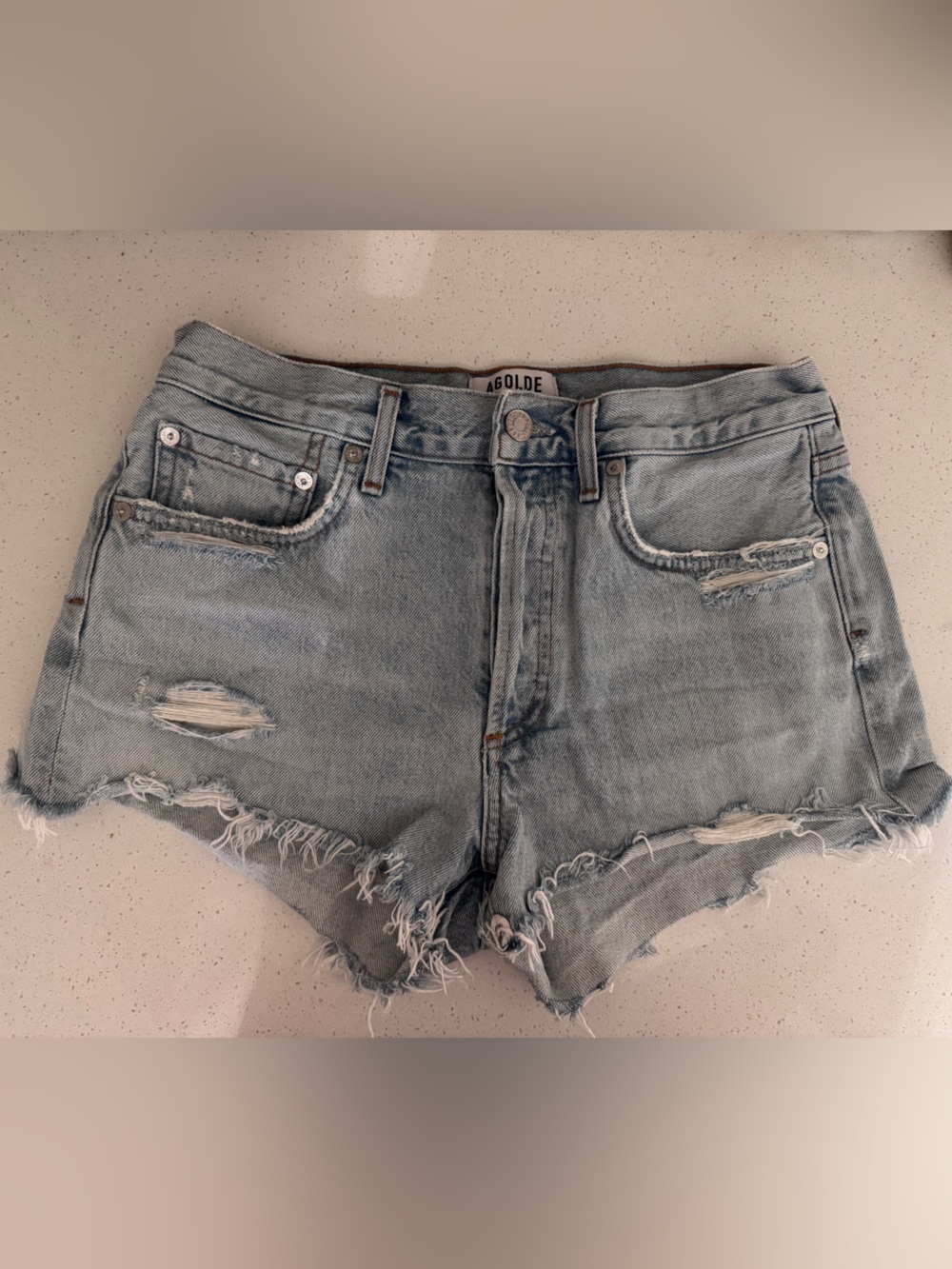 Agolde Light Blue Distressed Denim Cutoff Shorts